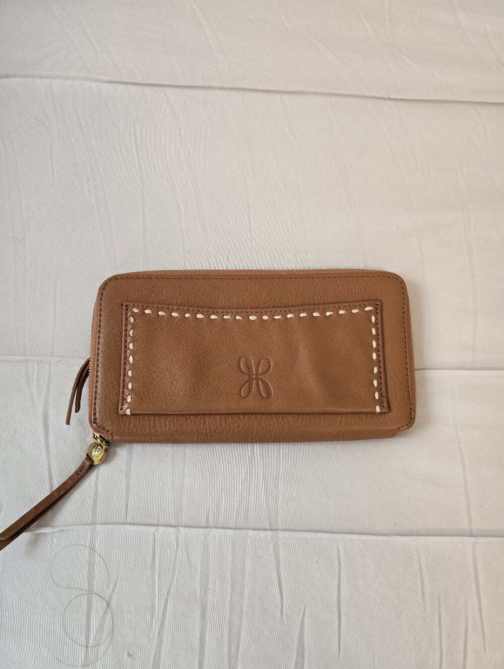 HOBO Embossed Leather Zip Wallet in Cognac Brown